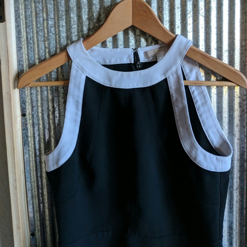 Banana republic top. Black with white trim around.